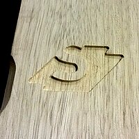 The company logo of Sonnemans milled into the wood with Compass Software