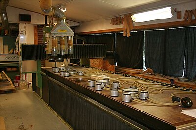 The CNC machine that was set up was a brand new technology in 1985 and it is still being operated and used as a backup machine in the woodshop today.