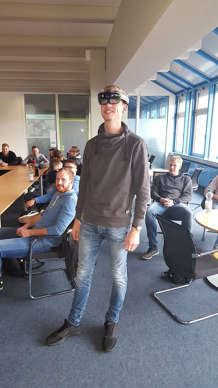The students at the Technical College in Beckum test out the Microsoft HoloLens augmented reality with Compass Software.